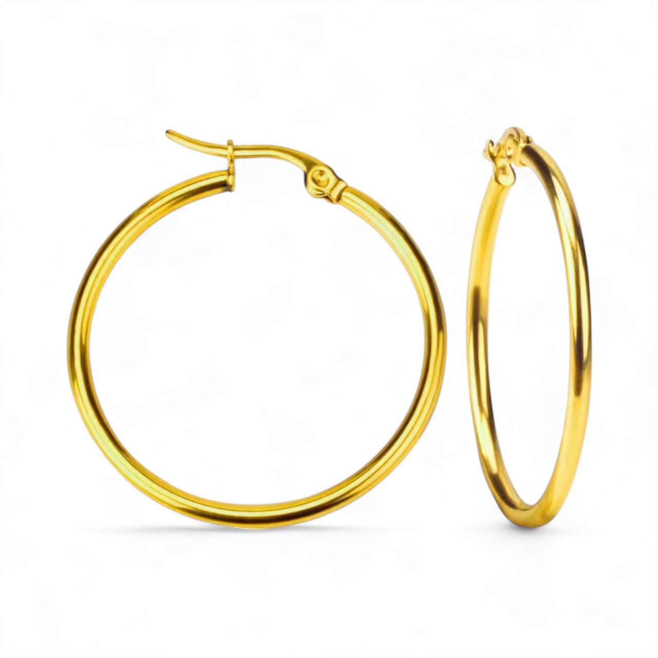 Gold hoop earrings on a white background