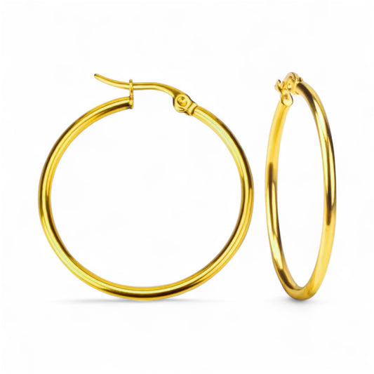Gold hoop earrings on a white background