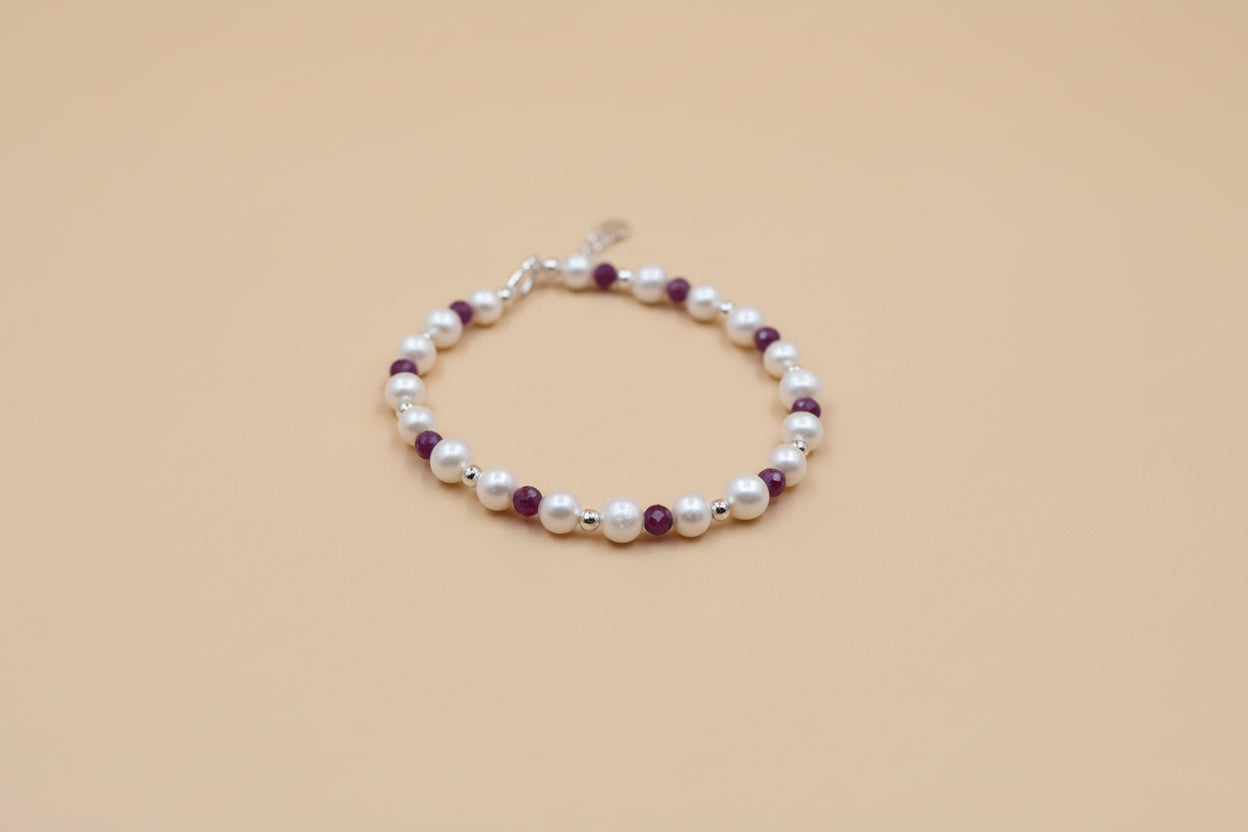Fresh water pearl, ruby and sterling silver bracelet