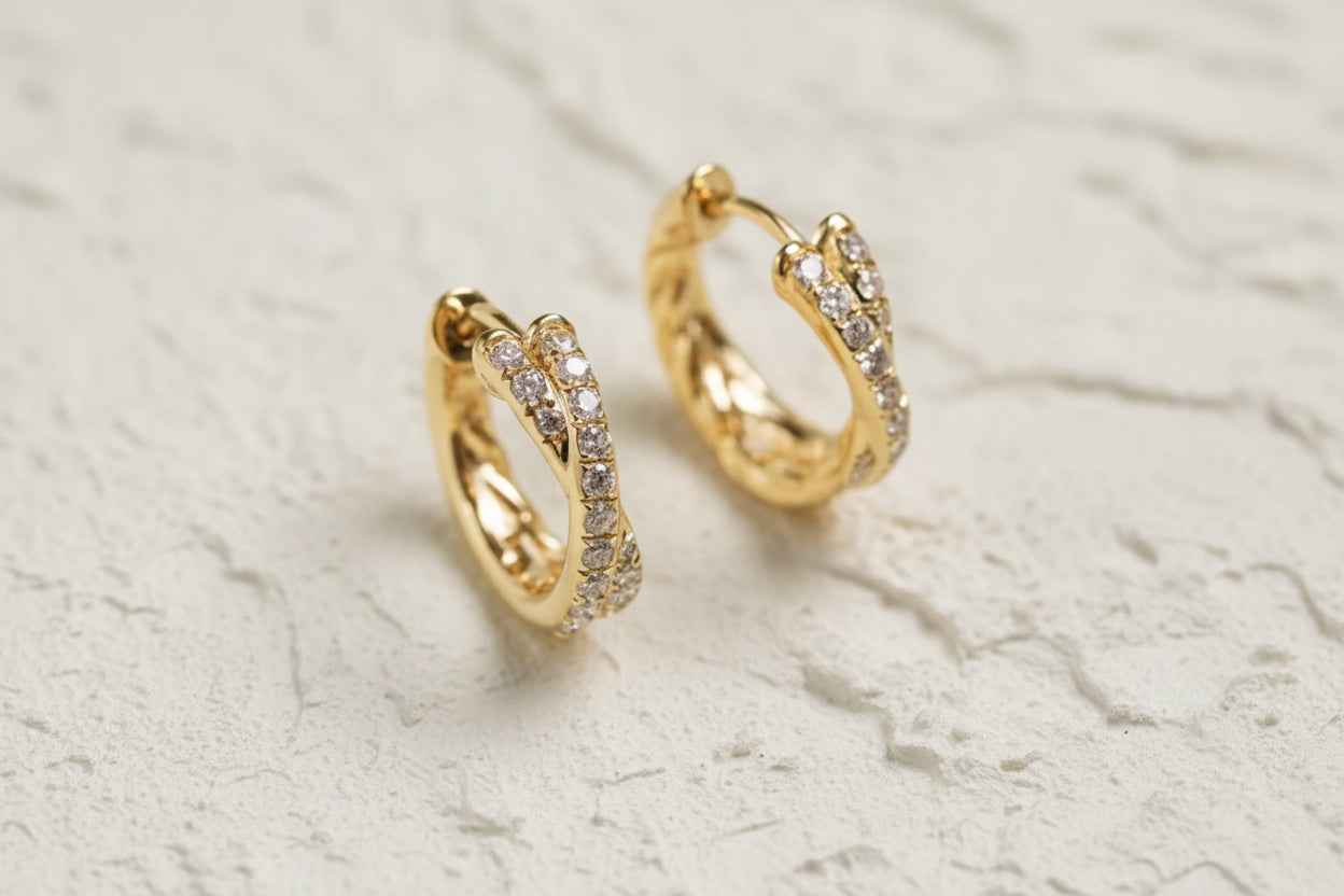 Cross over diamanté hoop earrings