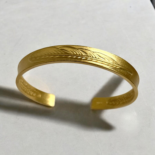 Sand gold feather bangle with inscription