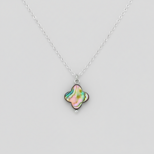 Abalone shell clover shaped pendant with a sterling silver chain.