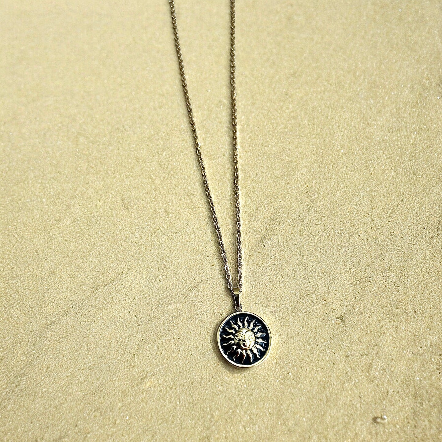 Black sun necklace