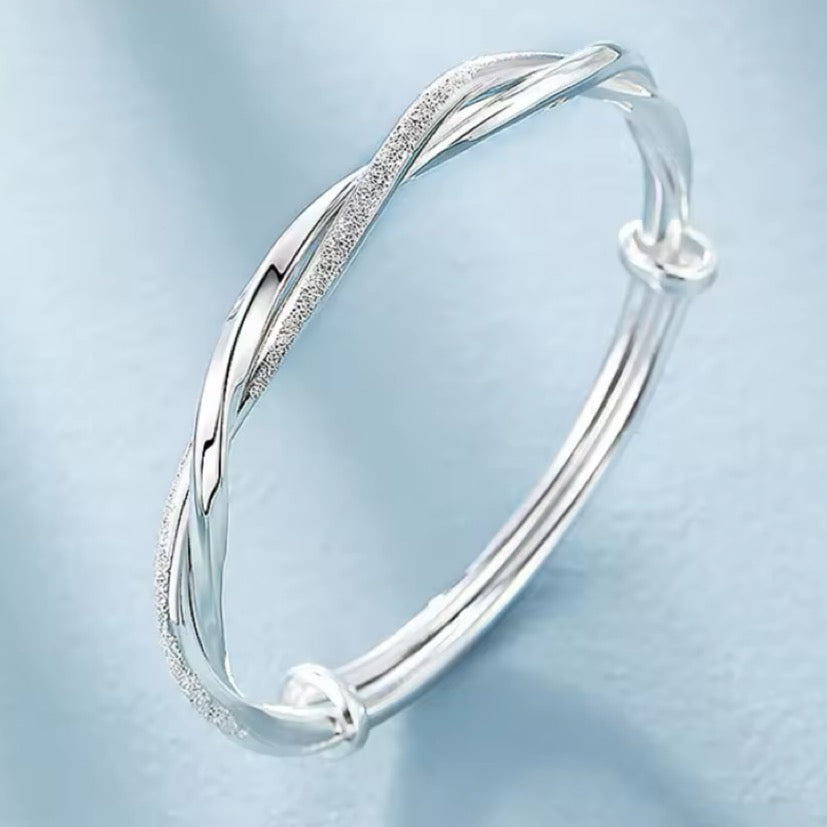 Sterling silver twisted gem bangle