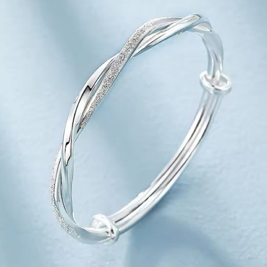 Sterling silver twisted gem bangle