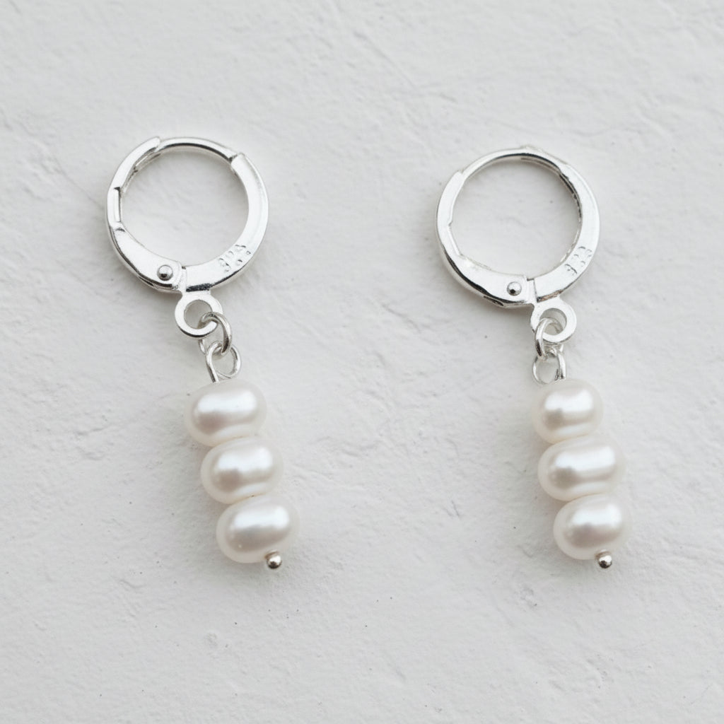 Pearl & 925 silver huggies