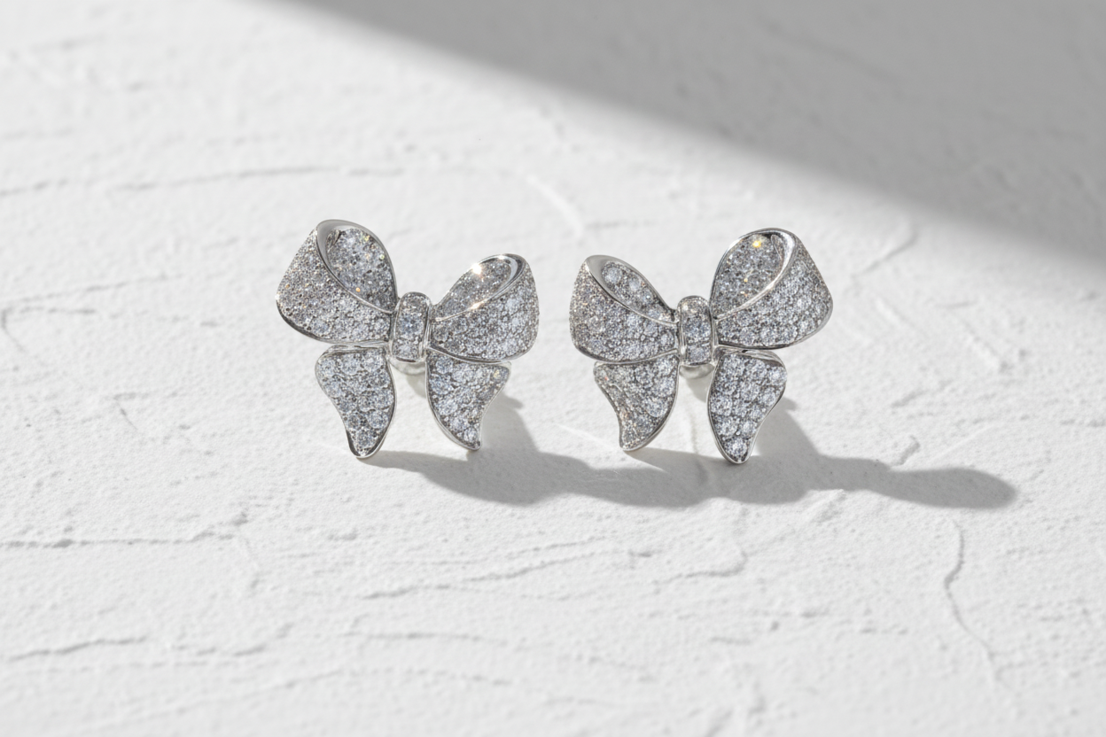 Diamanté bow earrings