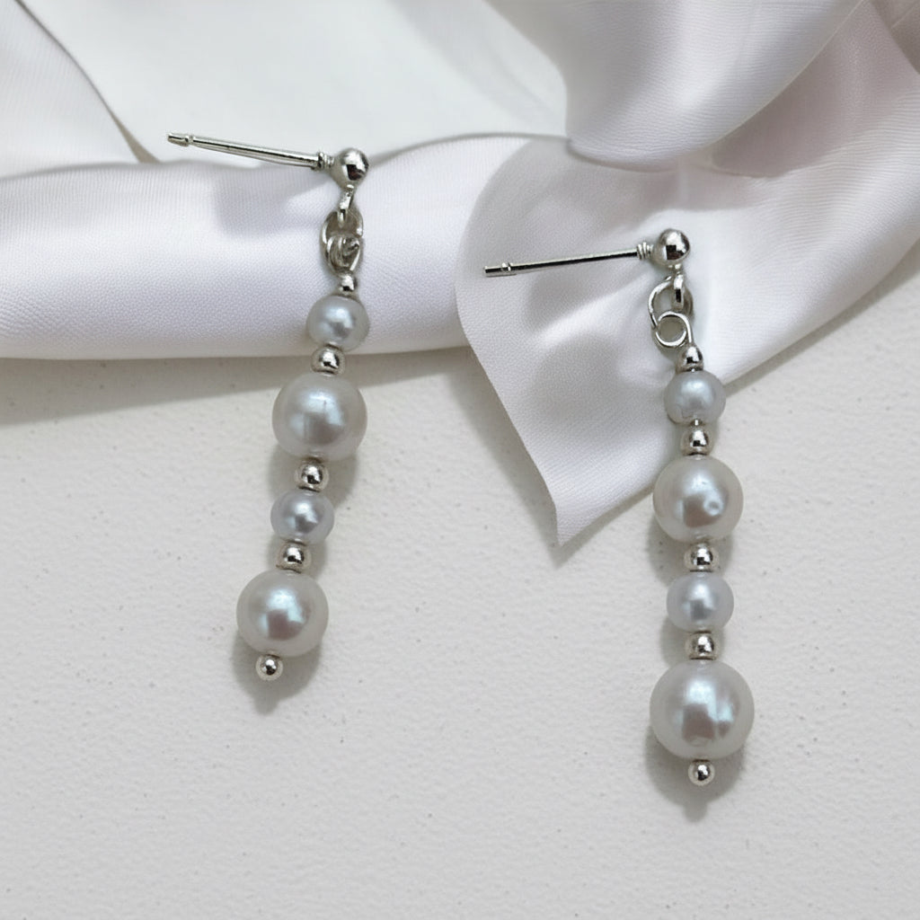 Pearl and sterling silver earrings