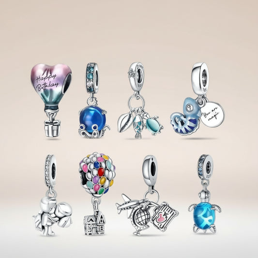 Collection of colourful silver charms