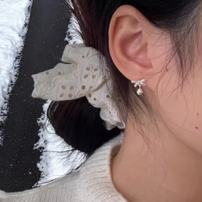 Bow & Pearl stud earrings