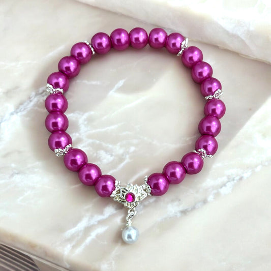 Magenta faux pearl lotus bracelet