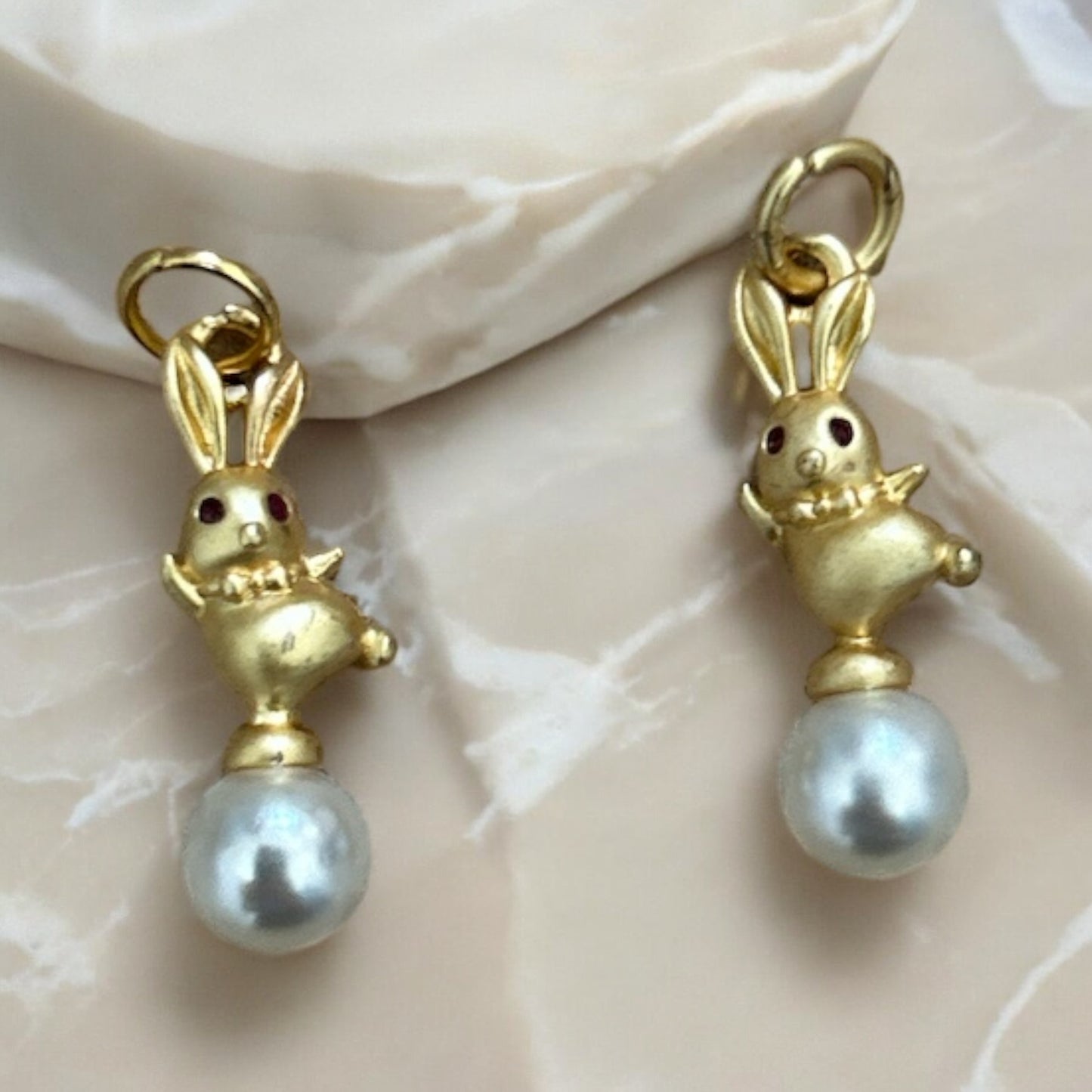 Rabbit and pearl charms