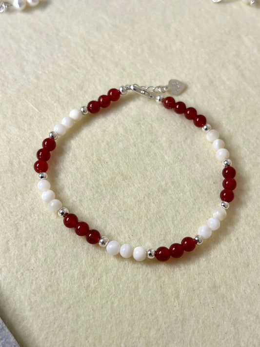 Carnelian, mother of pearl with sterling silver beads and fixings