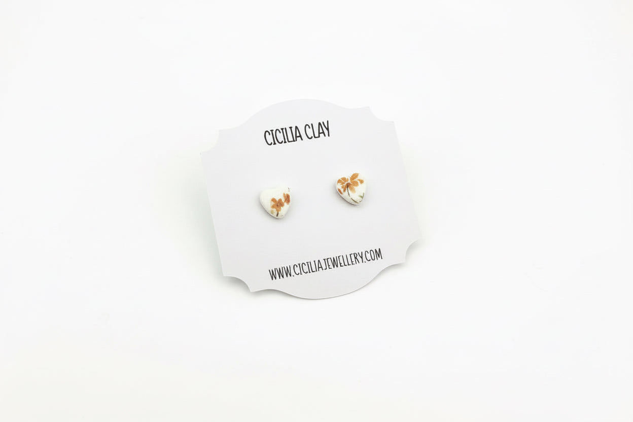 Orange wildflower heart stud earrings