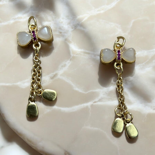 White & gold dangle bow charms