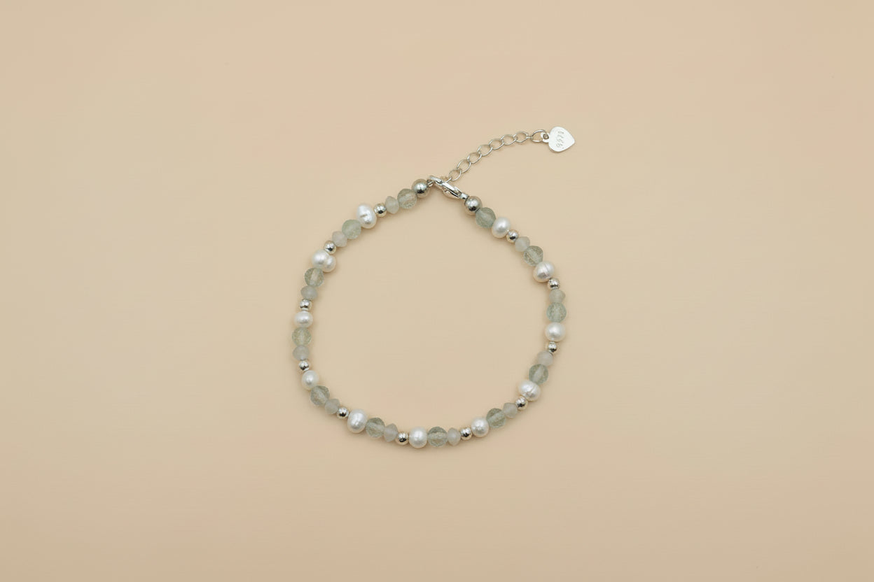 Fresh water pearl with faceted blue topaz and moonstone bracelet