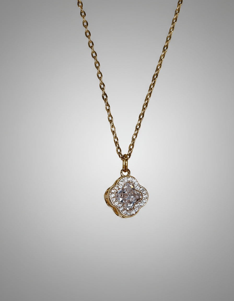 Necklace with a pendant on a light background.