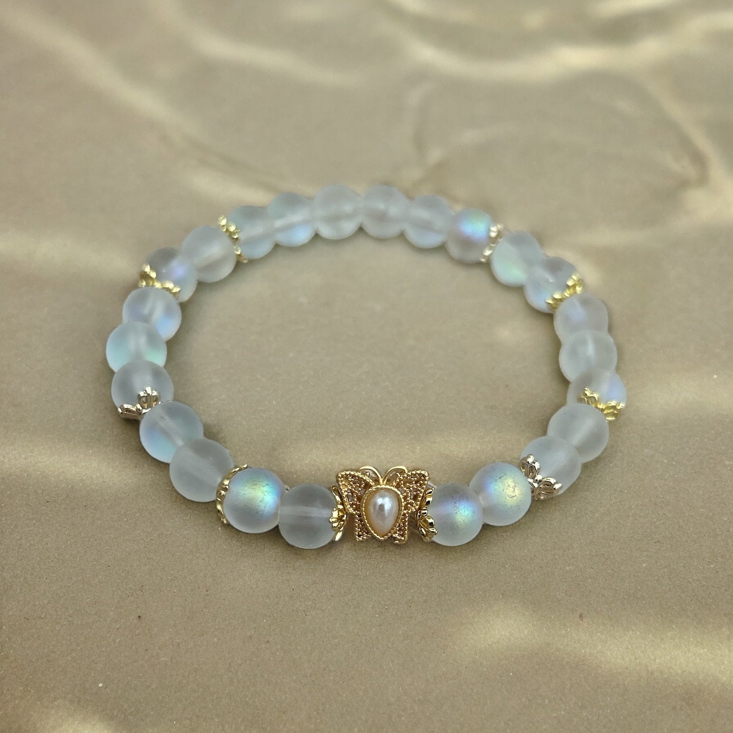 Frosted iridescent butterfly beaded bracelet