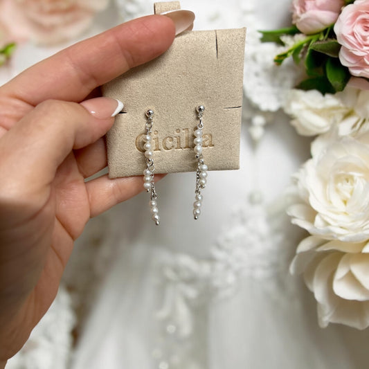 Tia dangle drop pearl earrings.