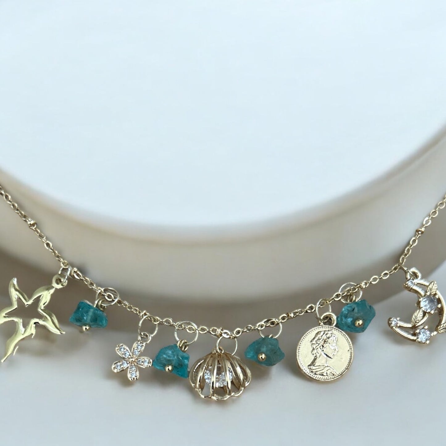 Charm necklace with raw apatite crystal
