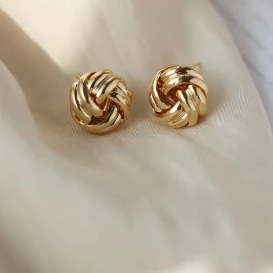 Gold knot stud earrings
