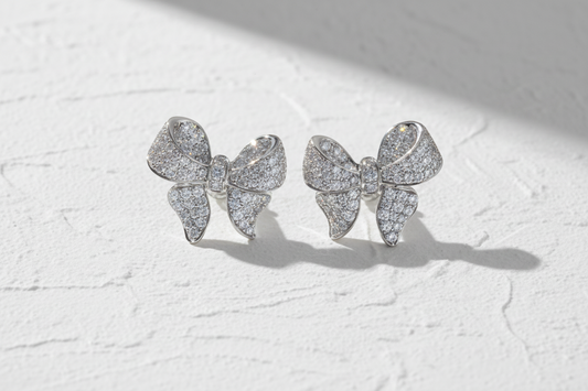 Diamanté bow earrings