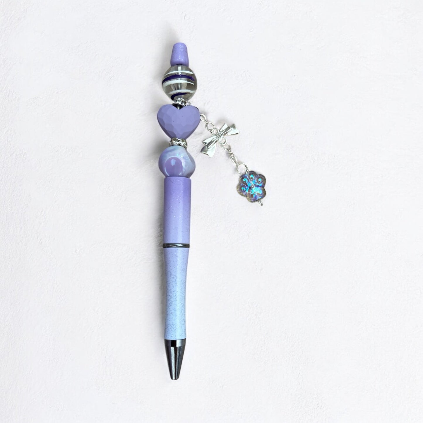 Purple & white bow & paw charm beaded pen