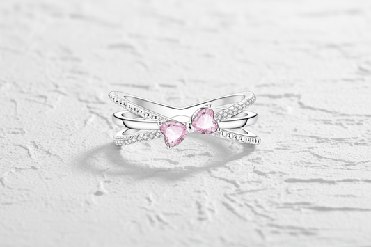 Sterling silver pink bow ring (size7)