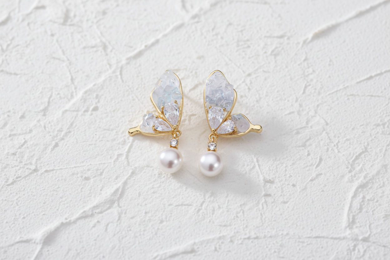 Butterfly & pearl stud earrings