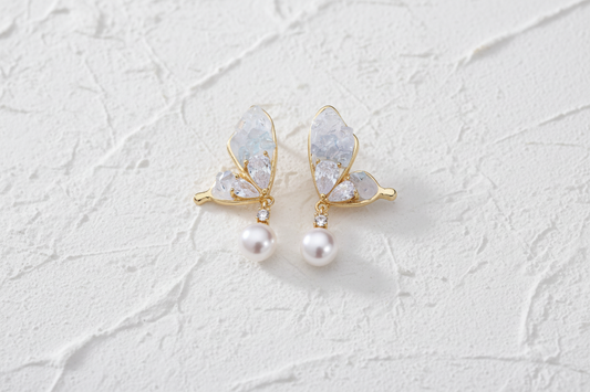 Butterfly & pearl stud earrings