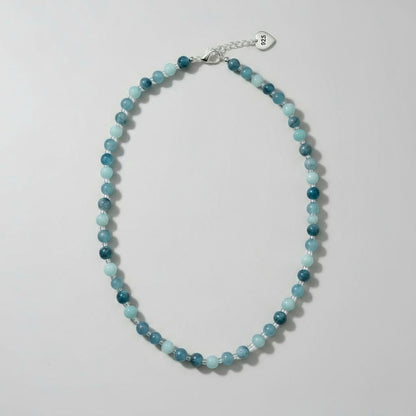 Beaded necklace with blue beads in alternating shades.