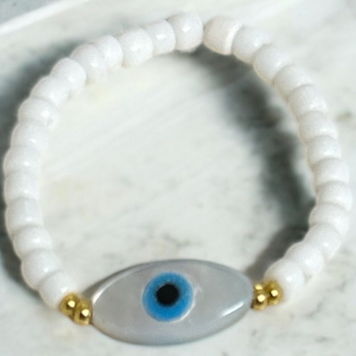 Mother of pearl evil eye ring
